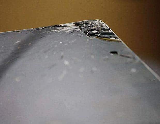 alt=cracked glass on an electronic device